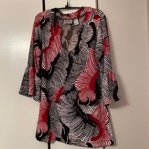 Chicos new without tags very cute top. Bell sleeves 95% polyester 5% spandex.